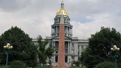Colorado husband allegedly accused by wife of not paying attention to her. Then he goes to the bathroom and returns to find her holding a shotgun