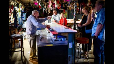 A 103-year-old World War II veteran has been tending the same basement bar in Maryland since 1963
