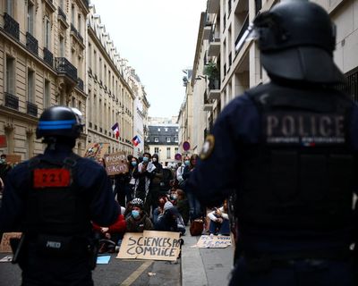 French police suspend use of stun grenades at school protests as minister rejects accusations of brutality