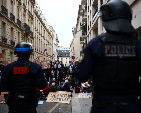 French police suspend use of stun grenades after high-school protester loses hand