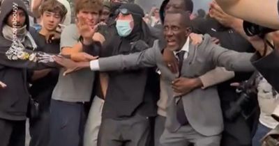 French mayor tear-gassed while shielding students from riot police
