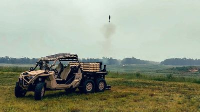 Polaris Just Built An RZR With 6 Wheels and Grenade System