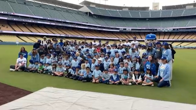 Will Smith brings 130 wildfire-hit students to Dodger Stadium for STEM day