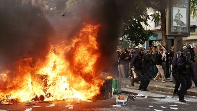 France suspends stun grenades after teen loses hand during student protest