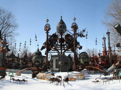 Tom Every spent decades turning salvaged machinery into Wisconsin’s 300-ton Forevertron; the 50-foot scrap-metal giant still stands at his family’s art park