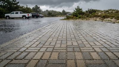 88-Mm Rain Test: Permeable pavement lot sheds no runoff in 88 mm storm; maintenance still key