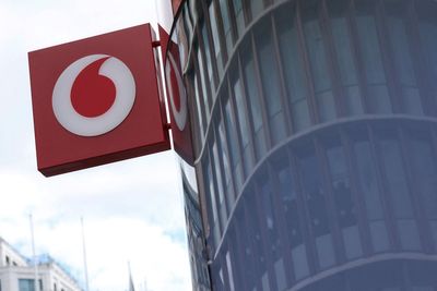VodafoneThree to slash £1bn in costs after creating UK’s largest mobile operator