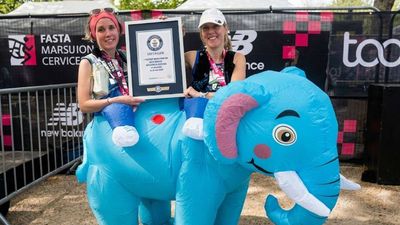 Two runners set a world record in a giant inflatable elephant at the London Marathon