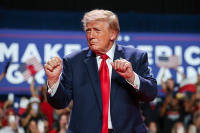 ‘That guy’s got to lose a lot of weight’: Trump lashes out at hecklers during Texas rally
