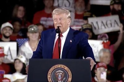 Donald Trump's Podium Grip, Facial Movements at Alabama Rally Fuel Health Scrutiny Despite 'Excellent' Checkup