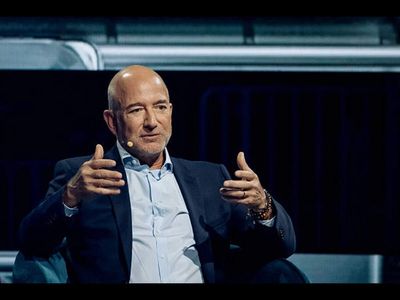 Jeff Bezos says AI could bring a 3 day work week, so why is Amazon cutting jobs?