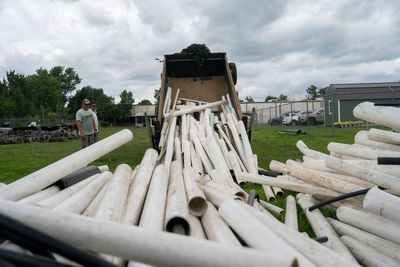 PVC pipes swept away by Hurricane Helene flooding still dominate cleanup of North Carolina river