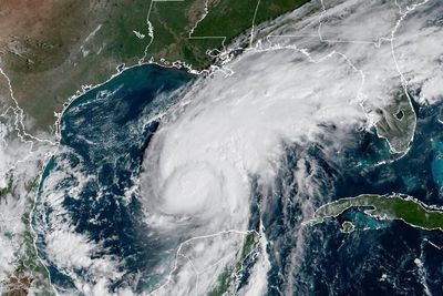 El Niño's storm-killer winds and climate's warming waters in fight over future of Hurricane Isaias