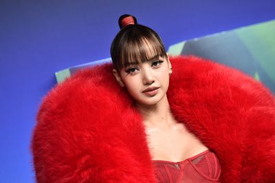 Lisa's Louis Vuitton After-Party Look Features a Pink Tweed Jacket and Miniskirt