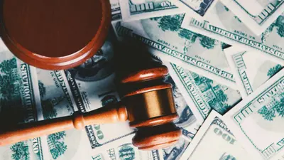Two men allegedly travel to Arkansas to collect cash from elderly fraud victim, unaware the person waiting for them was an undercover cop