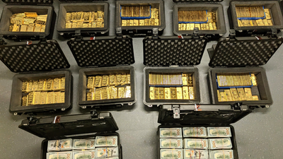 Federal executive created fake program, diverted $145M; FBI found 298 gold bars in $193.6M fraud