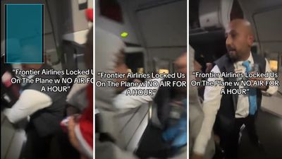 A passenger tries to open the exit door after the flight is stranded at the gate, but the Frontier flight attendant pushes her instead