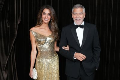 1Amal Clooney Lights Up the Albies Red Carpet in a Gold Sequined Gucci Gown