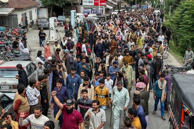Families demand answers after deadly poll violence in Pakistan-administered Kashmir
