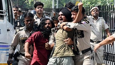Thousands detained in New Delhi as police crack down on 'cockroach' movement