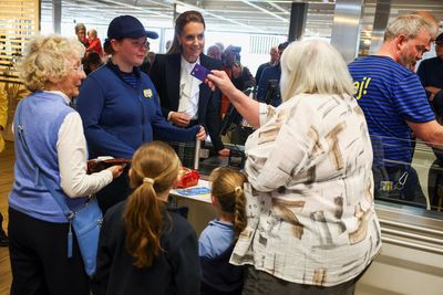 William and Kate surprise Ikea shoppers as they help out behind counters