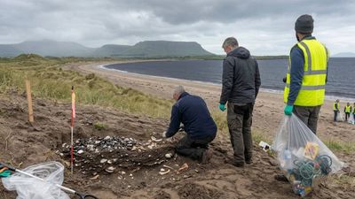 Volunteer Find Reveals Midden: beach cleanup uncovers prehistoric site; erosion now threatens archaeology
