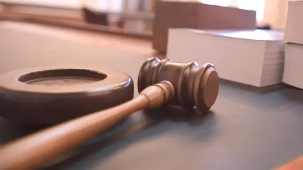 A judge seals Cornell case files after a Marine who shares a name with one of the accused men and his family face threats over a wrong address