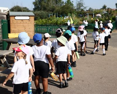 Retrofit schools and consider moving exams to beat extreme heat, says teaching union leader