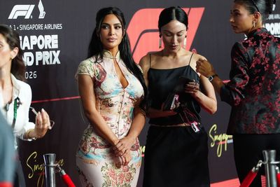 Kim Kardashian more at home with Martin Brundle at Singapore Grand Prix