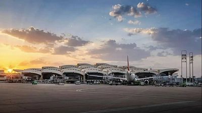 Saudi-led coalition says a projectile has struck a passenger terminal at the airport in Riyadh