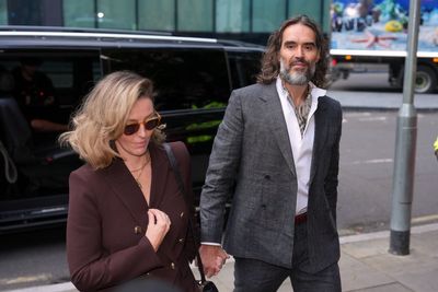 Russell Brand arrives at a London court for his trial on rape and sexual assault charges