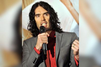 Russell Brand's Wife Stands by His Side as Comedian Appears in Court for Rape Trial Involving Six Women