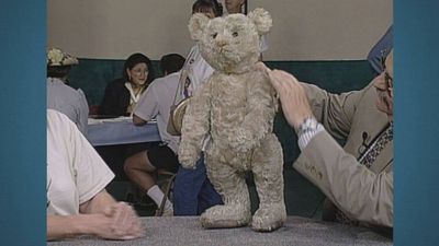 An antique teddy bear valued at $7,000-$8,000 in 1996 gets a $10,000 updated value in 2026
