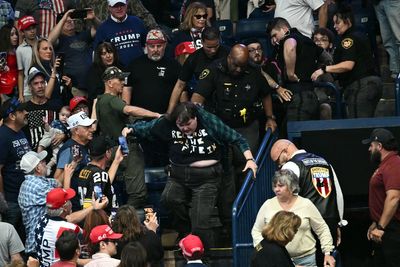MAGA crowd pummels protester during Trump rally - and the internet wants her to sue