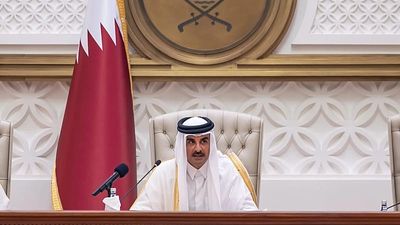 Qatar’s emir vows that country will emerge stronger as he outlines national strategies