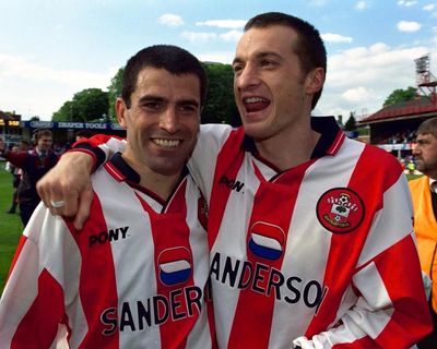 Have any footballers ended their career with more own goals than goals?