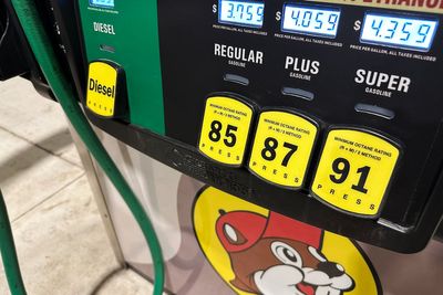 Energy agency lowers world oil demand forecast for the year