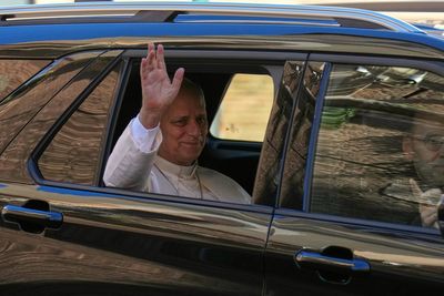 Photos show Pope Leo XIV at hospital and supporters praying as he undergoes cancer surgery