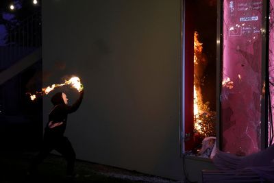 Tear gas, fires and clashes as anti-government unrest escalates in Albania, in photos