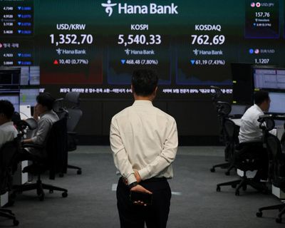 Wall Street drops after jump in US producer inflation; John Healey says UK banks are part of ‘jewel in the crown’ – as it happened