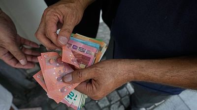Euro slides to fresh lows against US dollar and British pound despite ECB rate hikes