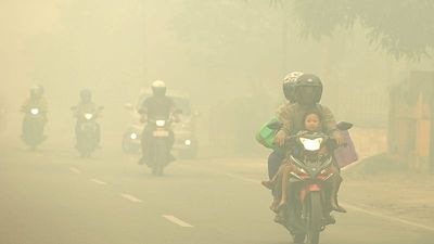Indonesia's skies turn apocalyptic orange as smoke blankets Singapore