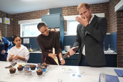 Royal icing proves beyond Harry’s talents as he and Meghan take on cupcakes task