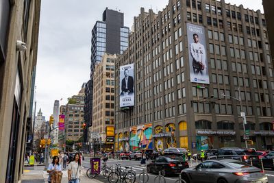 'Not That Kind Of Model': Why Are Two Entrepreneurs On A Giant Billboard In SoHo?