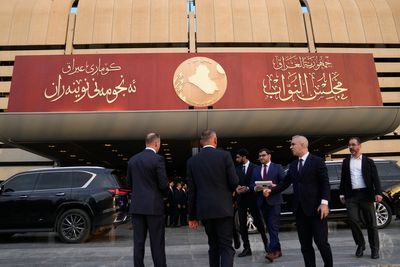 Iraq parliament fills Cabinet posts, naming a US-sanctioned deputy prime minister