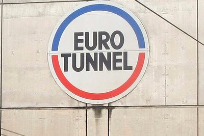 Minibus slams into Channel Tunnel shuttle train, injuring 19 and halting service