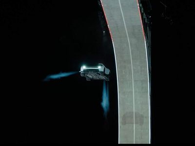 Tesla Roadster: Elon Musk uploads video showing Tesla flying over a truck and other vehicles, watch viral footage