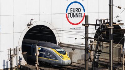 Nineteen injured as minibus crashes into Channel Tunnel shuttle train