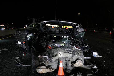 Sleeping Tesla driver using self-driving mode crashes into police car injuring officers