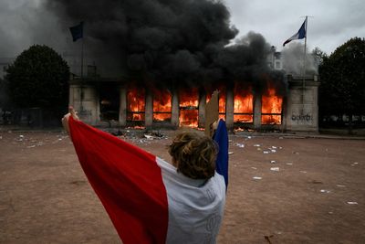 'France, truly, is on the brink' and just days away from a make-or-break moment in its debt crisis, analyst warns, as protests turn into riots